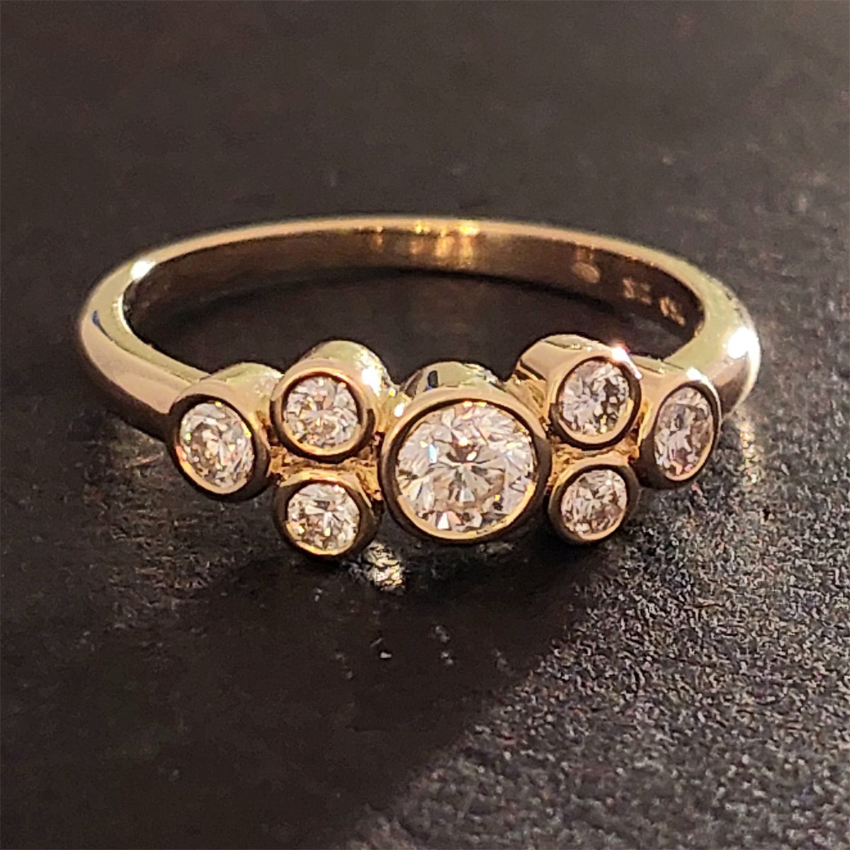 YELLOW GOLD RING 7 DIAMONDS