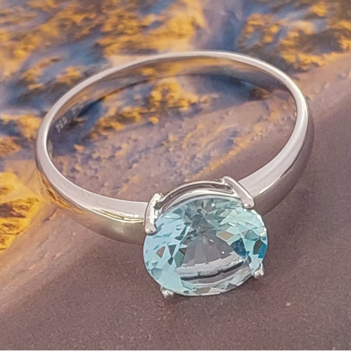 ANILLO ORO TOPACIO AZUL 2 KTES