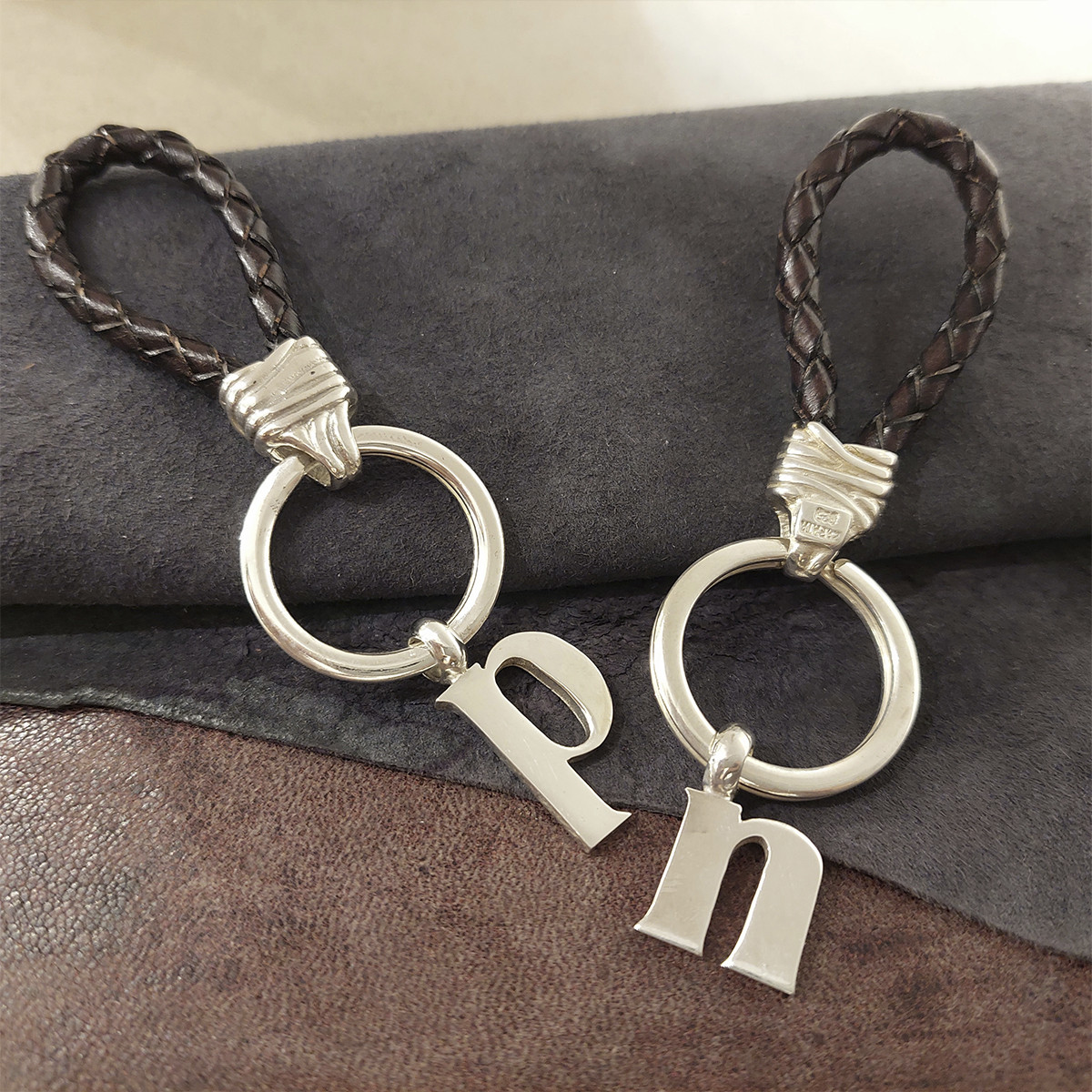 SILVER AND LEATHER KEYCHAIN