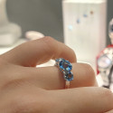 GOLD RING AND 3 BLUETOPAZ