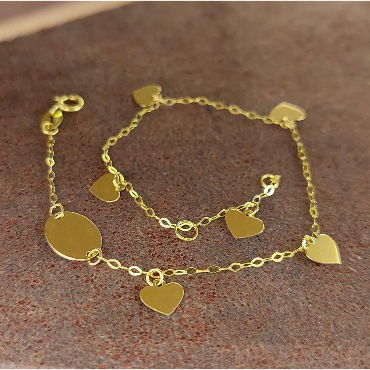 GOLD BRACELET WITH 5 HEARTS