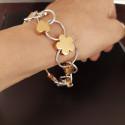 PULSERA  ORO BLANCO CON MOTIVOS ORO ROSA