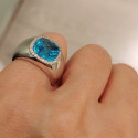 RING WITH BLUE TOPAZ AND DIAMONDS 0.13 KTES