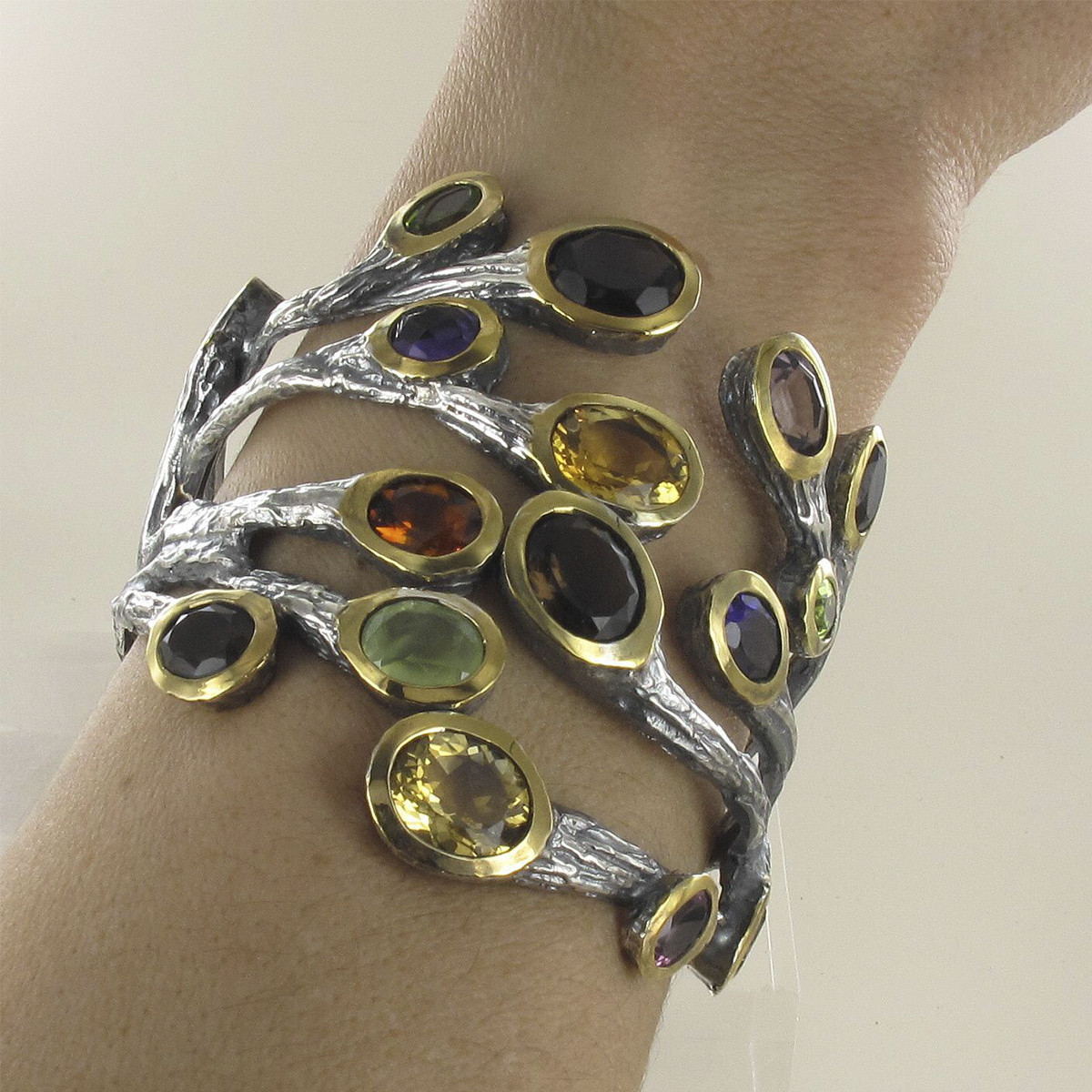 SILVER AND GOLD BRANCH-SHAPED BRACELET WITH STONES