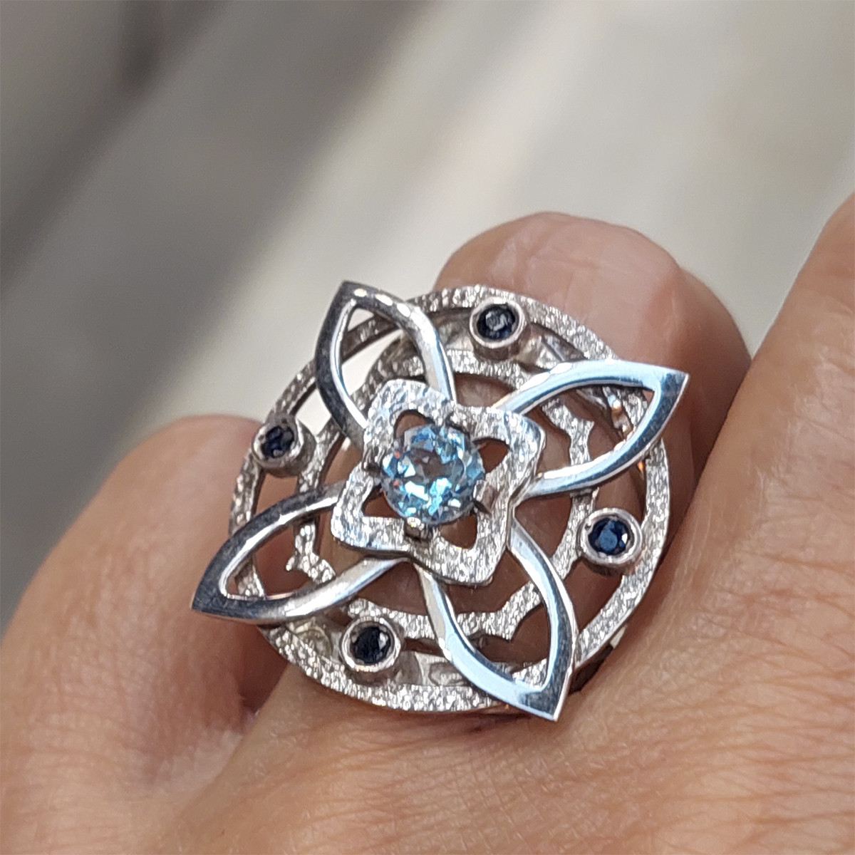 SILVER FLOWER RING AND SAPPHIRES