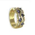 GOLD RING WITH BLUE PRECIOUS STONES