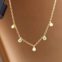 SHORT GOLD NECKLACE WITH DIAMONDS AND EMERALDS