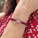 PULSERA MACRAME ORO Y RUBIS