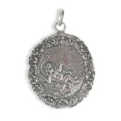 STERLING SILVER CRADLE MEDAL