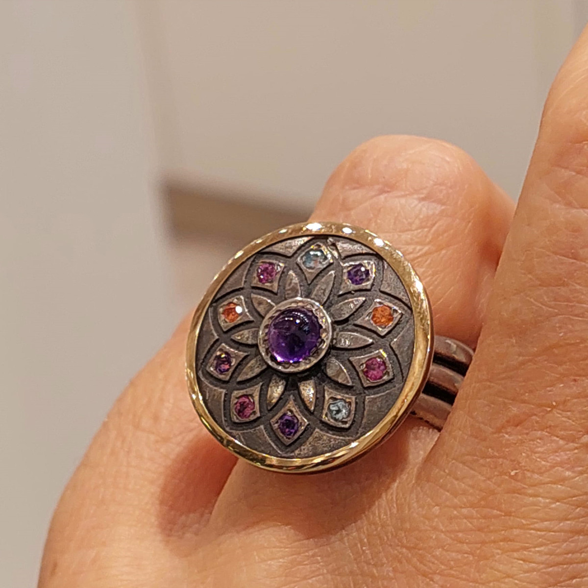 STERLING SILVER AND GOLD RING WITH COLORED STONES