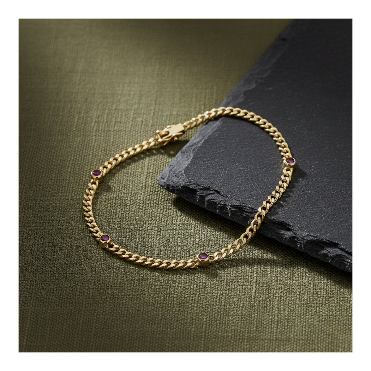 GOLD BRACELET WITH 4 RUBIES